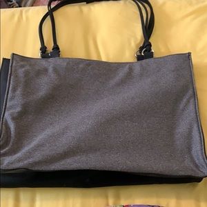Gray and black handbag